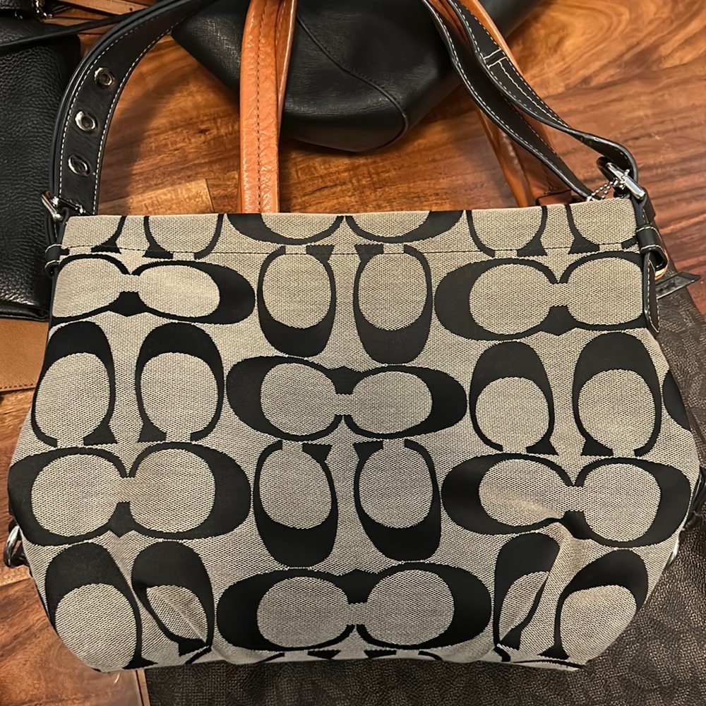 Used/Authentic Coach Purse - Good Condition. Small tear on bottom left corner